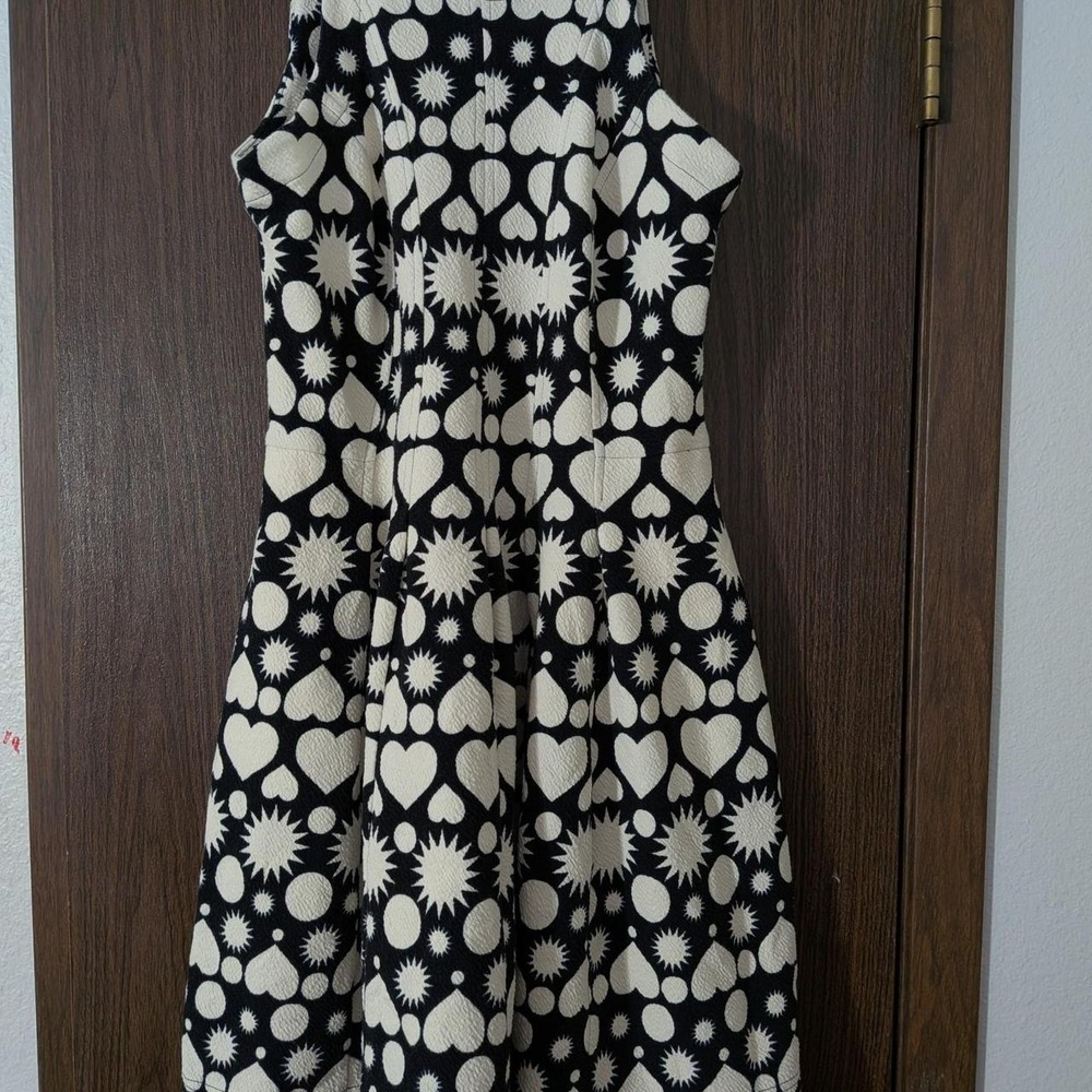 Maeve by Anthropologie black and white midi dress with pockets.